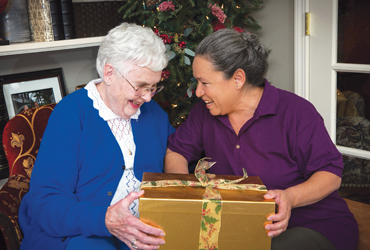 client and caregiver receive gift