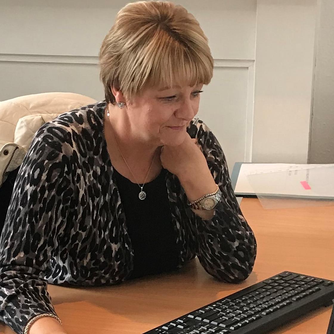 Training Manager at her desk