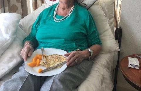 lady eating pancakes